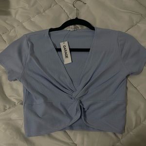 Women’s blue top